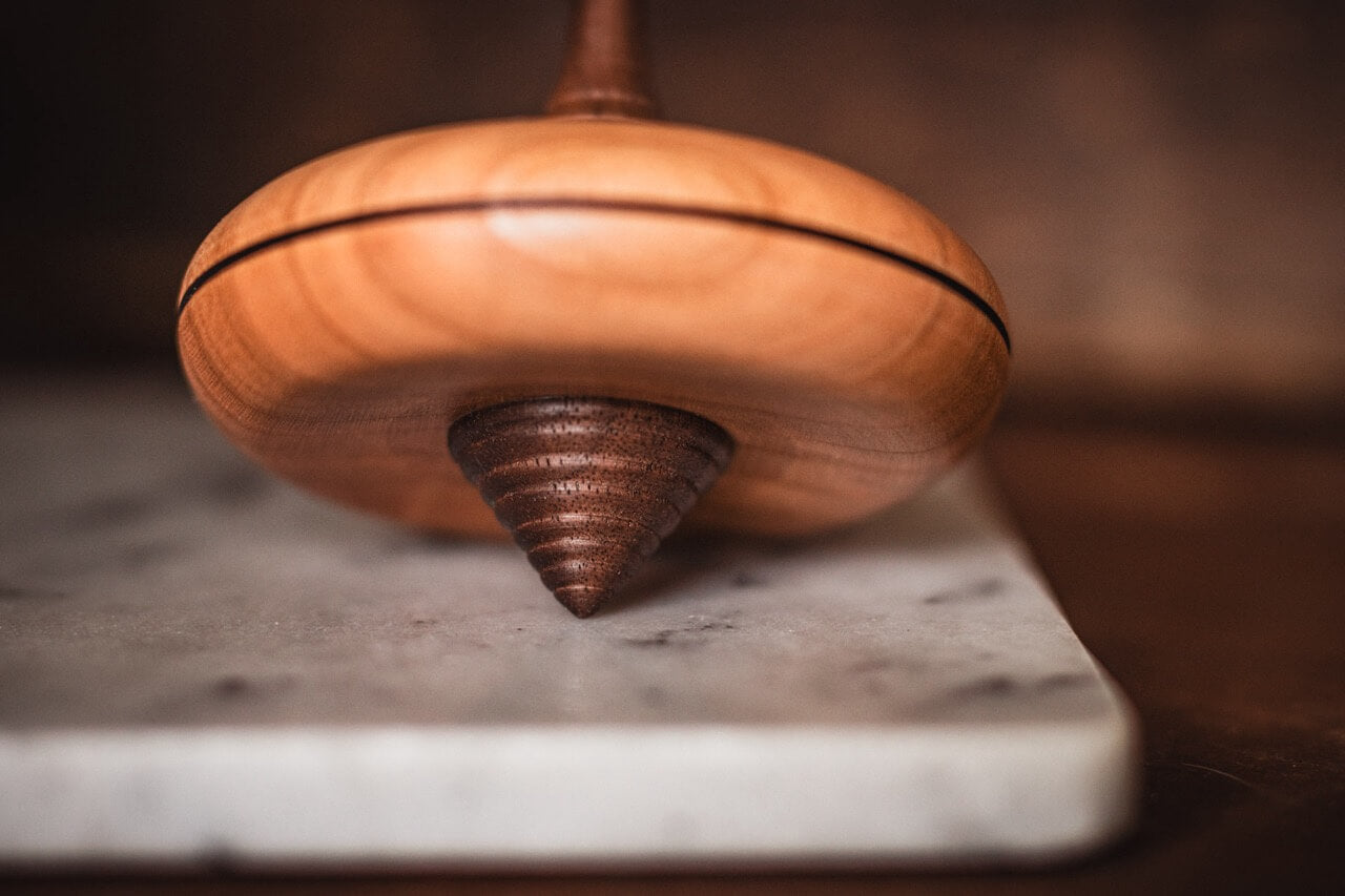 Ali Spinning Top