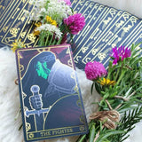 Tarot card titled 'The Fighter' with flowers and herbs on a textured surface
