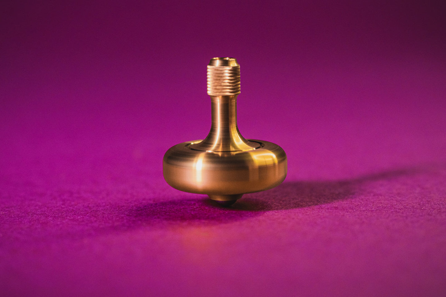 Lambda Spinning Tops