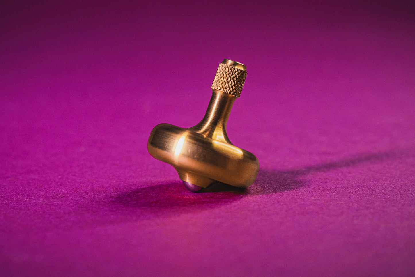 Lambda Spinning Tops