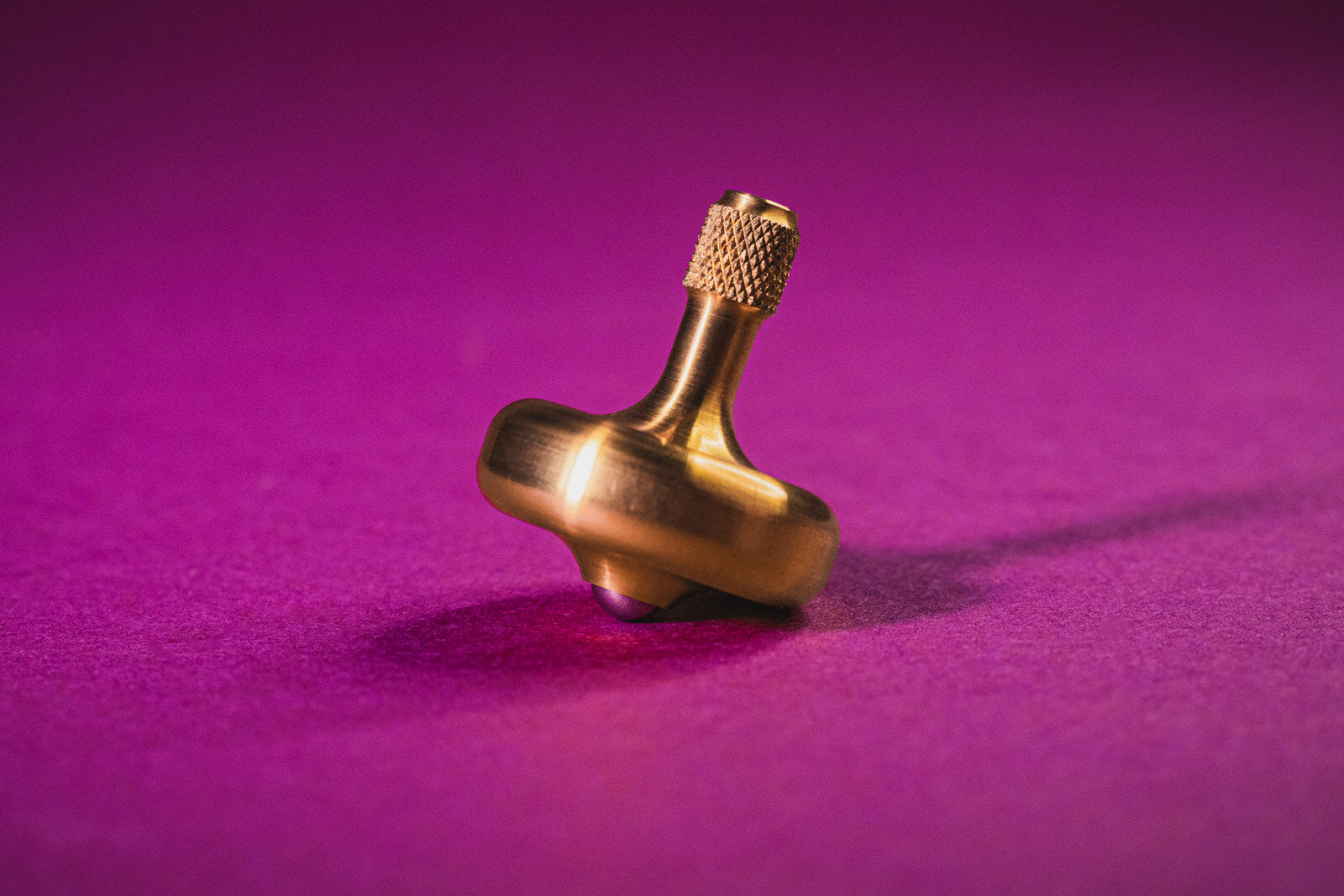 Lambda Spinning Tops