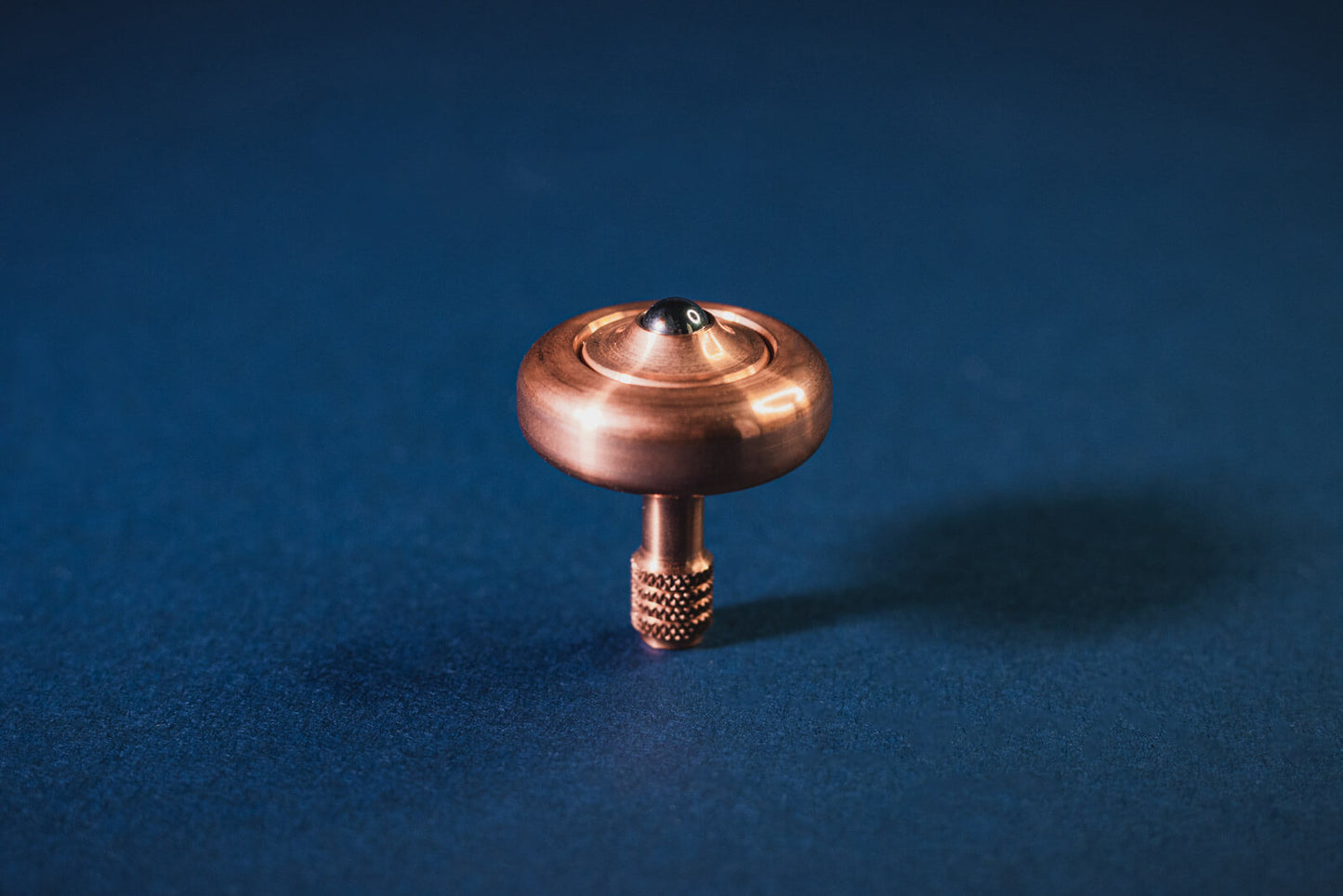Lambda Spinning Tops