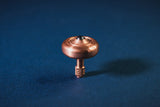 Lambda Spinning Tops