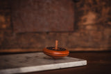 Leporello Spinning Top