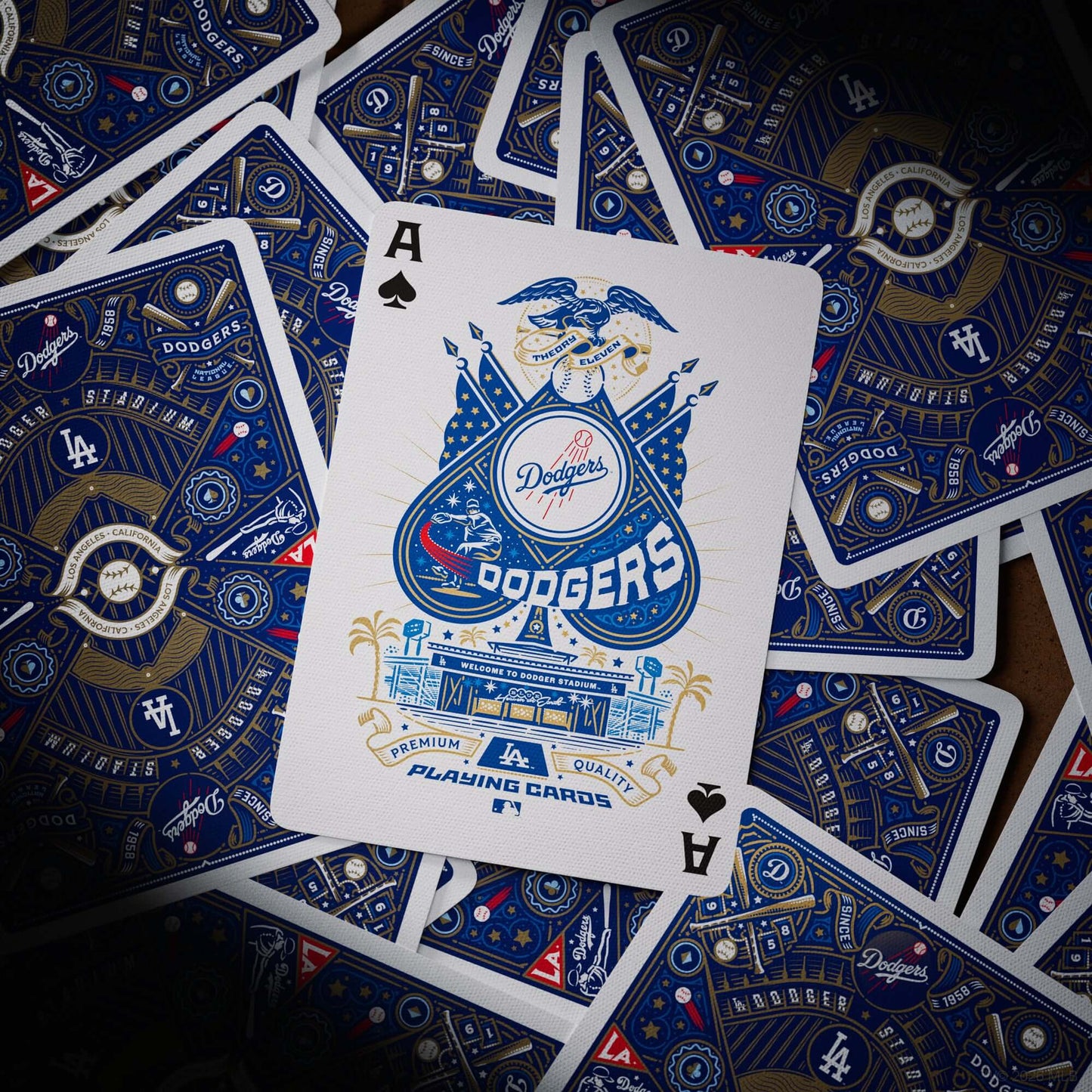 Playing cards with Dodgers logo and design on a dark background