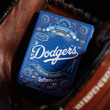 Blue Dodgers playing cards packaging on a leather surface